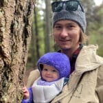 steve andrews and his daughter next to a tree