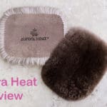 a set of beaver fur handwarmers by aurora heat