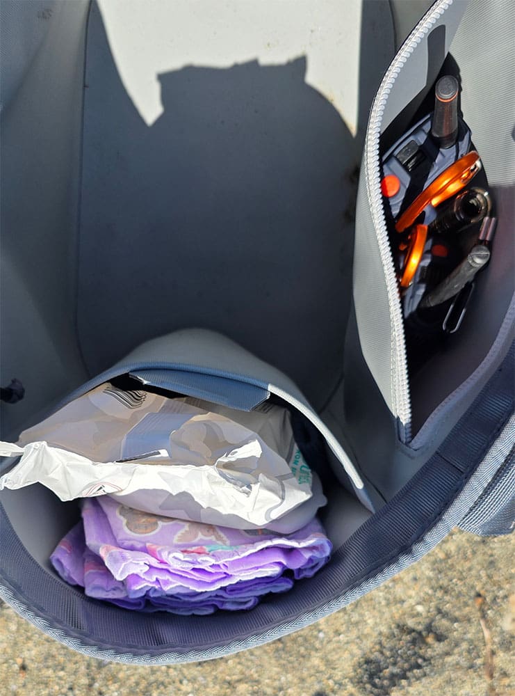 a look inside the Yeti Camino beach tote and its side pockets, filled with family accessories.