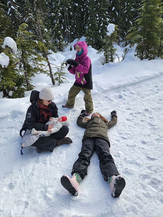 kids playing in the snow up at the sea to sky gondola
