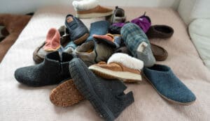 a collection of slippers that were reviewed for camping, travel, and at home
