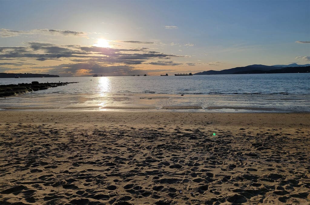 a view looking over the ocean from Third Beach in Vancouver BC